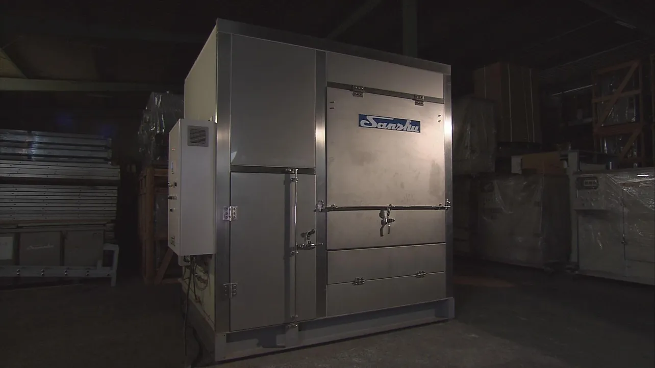【写真を見る】三州産業株式会社が開発・製造した「蒸熱処理装置」