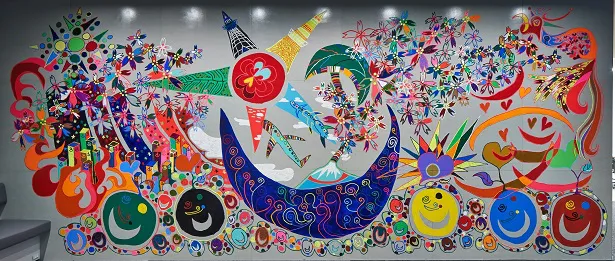 日本財団パラリンピックサポートセンターのキーメッセージ「i enjoy !」をテーマに香取慎吾が描いた壁画