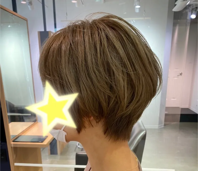 新たな髪型の横顔写真も掲載した石田明の妻
